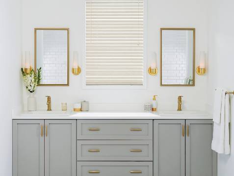 Hunter Douglas EverWood® Alternative Wood Blinds above a master bedroom vanity